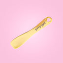 gold applicator spoon